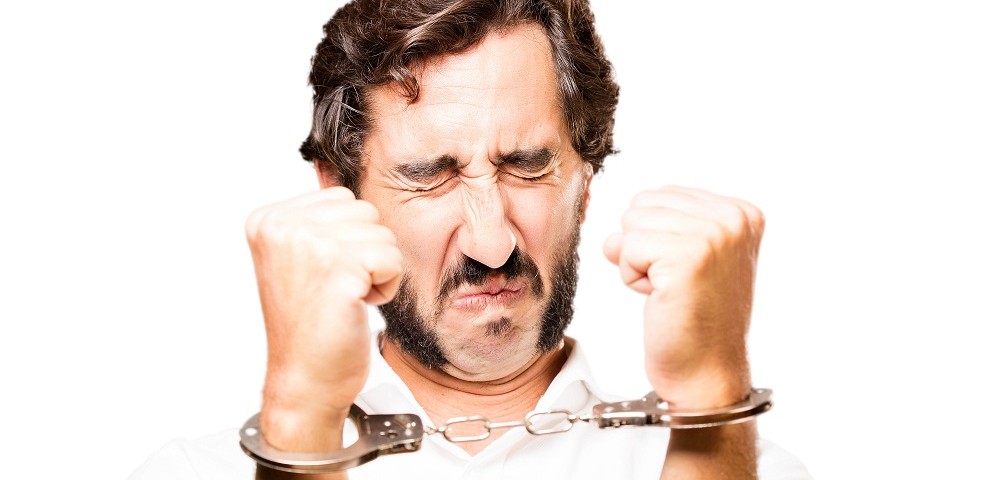 young cool man with handcuffs